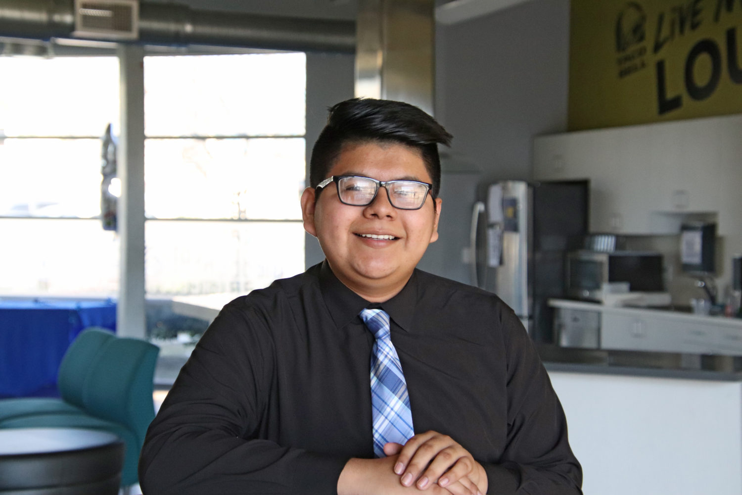 Nicolas Sanchez, our 2020 Youth of the Year, poses in Joe's Garage Teen Center at the Santa Ana Club